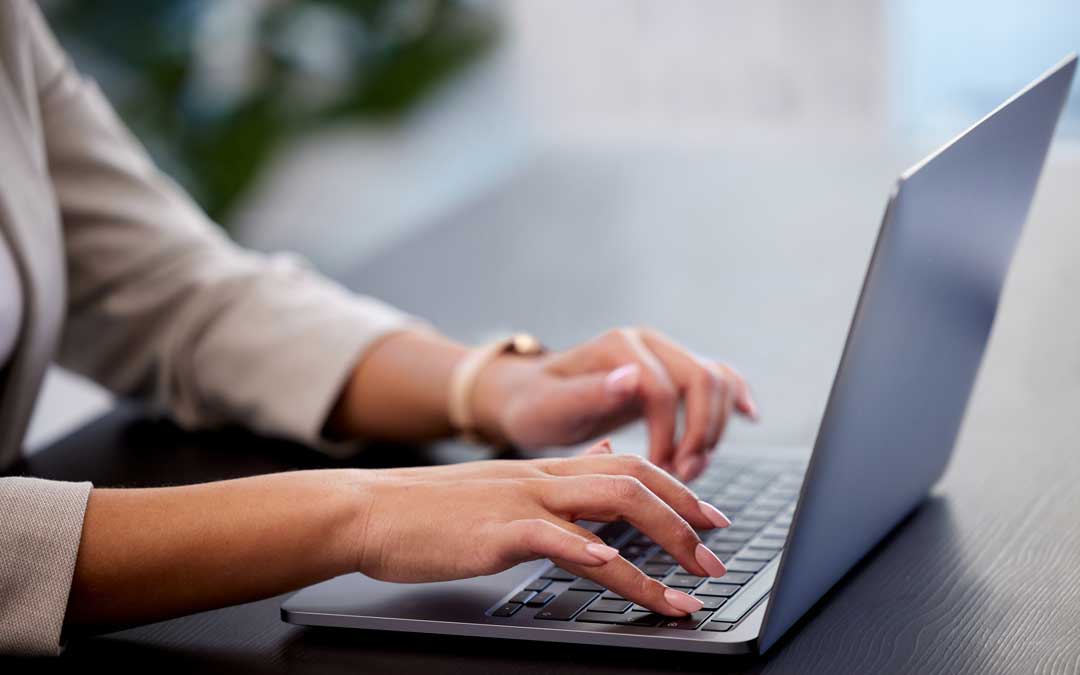 invoicing time is money cropped shot of a young businesswoman working on laptop invoicing time is money cropped shot of a young businesswoman working on laptop